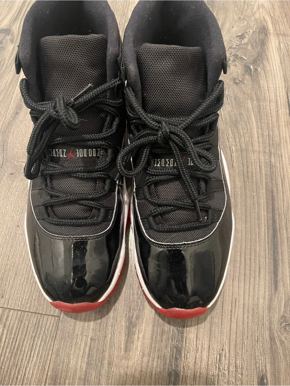 Jordan Bred 11s Retro High-Top Sneakers (Size 12)